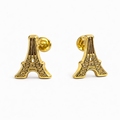 Broquel en oro de 10K con diseño de la Torre Eiffel, grabado detallado, de la colección de Joyería ROMA.