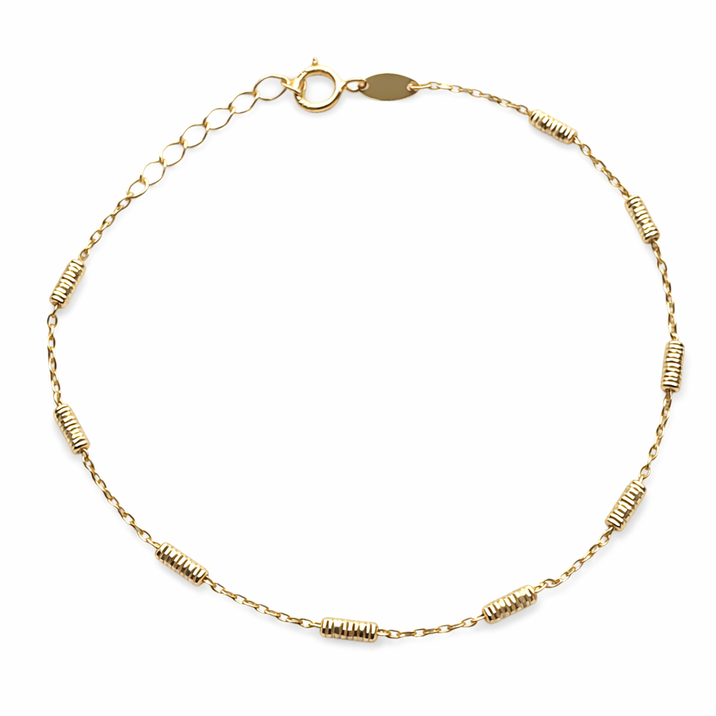 Pulsera de tubitos en oro 10K de Joyería ROMA, diseño delicado y brillante para lucir elegante.