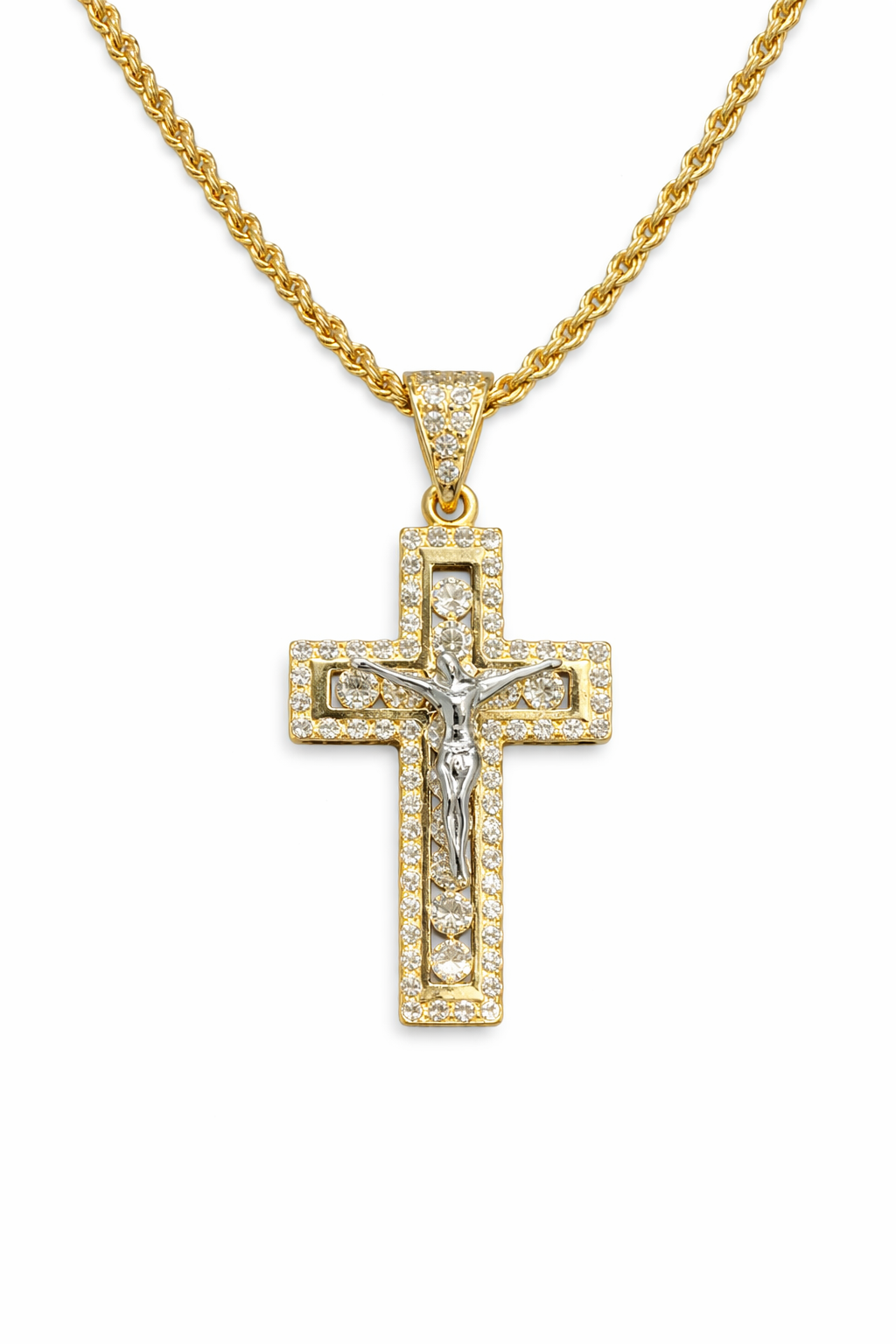 Cruz con Cristo y zirconias en oro 10K, joyería ROMA, con detalles brillantes y diseño elegante visible en la imagen