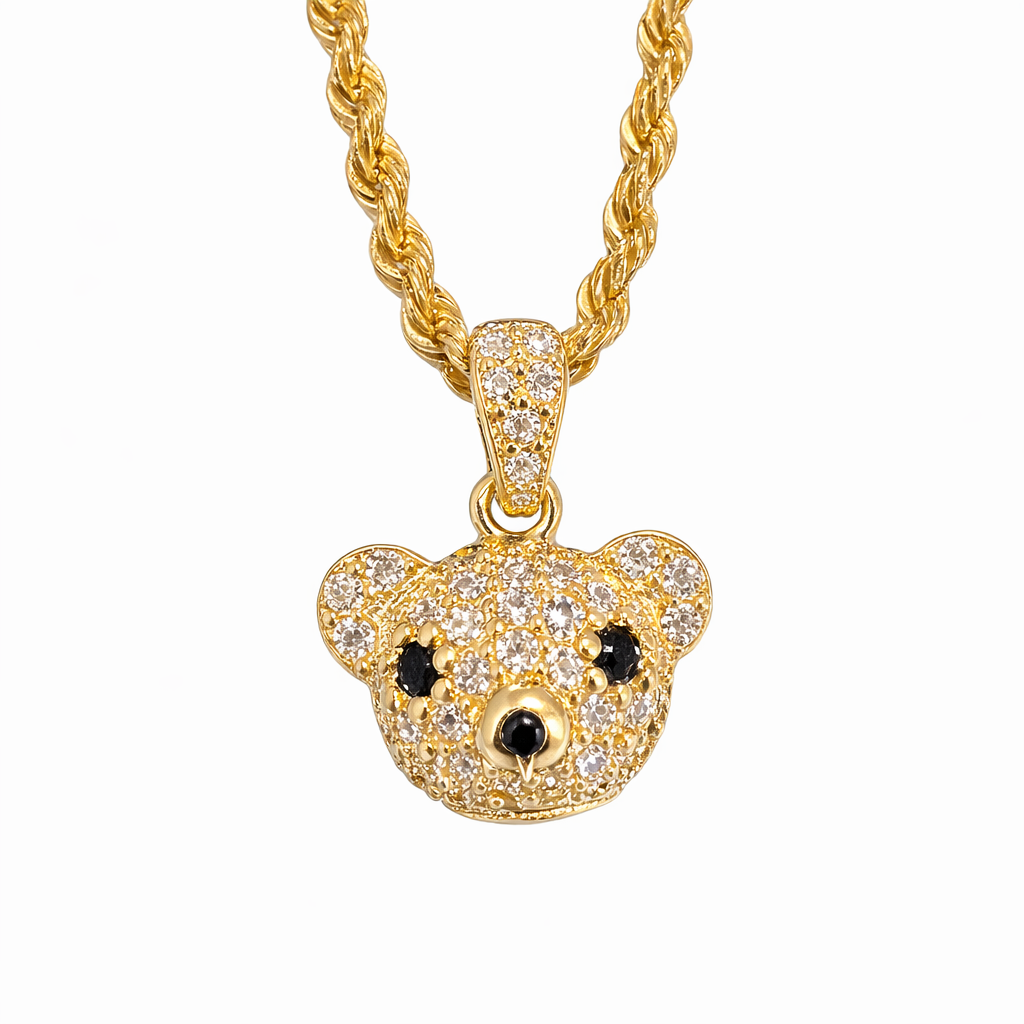 Osito de oro 10K con zirconias brillantes, pieza de joyería elegante y delicada de Joyería ROMA.