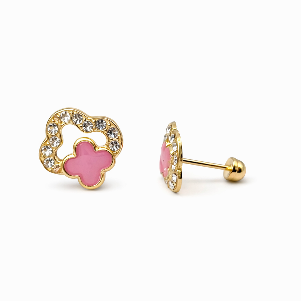 Broquel trébol de zirconia en oro 10K de Joyería ROMA, con diseño elegante y brillante, visible en la imagen.