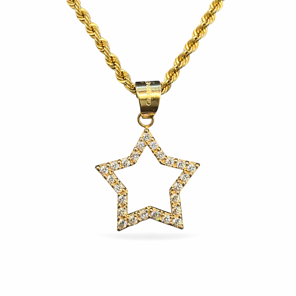 Estrella de oro 10K con zirconias brillantes, joyería elegante y moderna de Joyería ROMA.