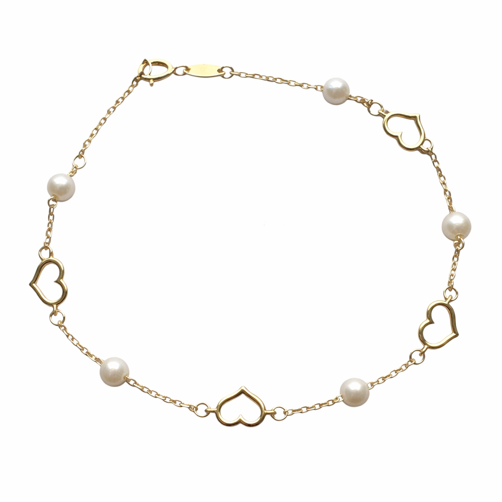Pulsera de corazones con perlas en oro 10K de Joyería Roma, elegante y delicada, con detalles en forma de corazones y perlas blancas