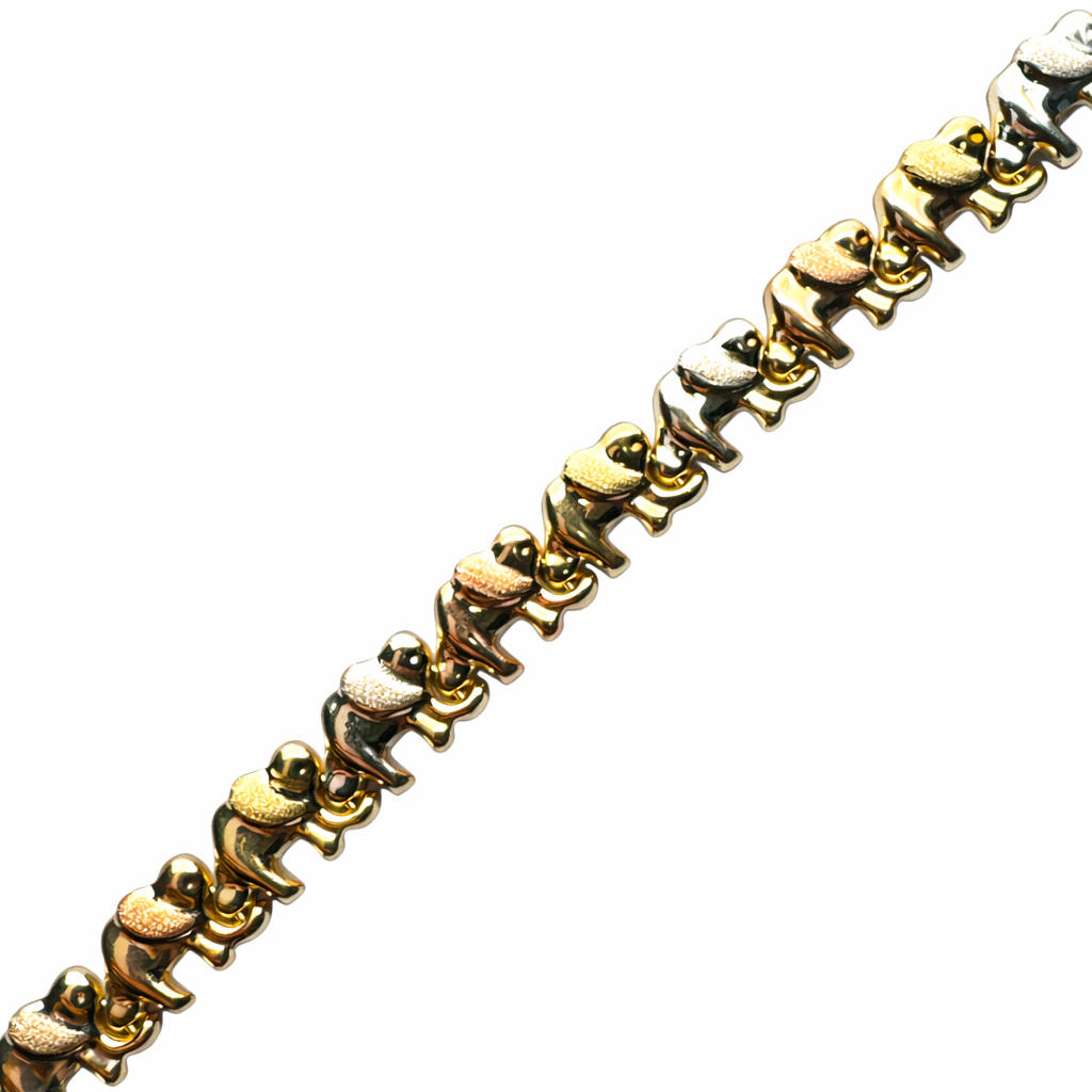 Pulsera de elefantes tricolor en oro 10K de Joyería Roma, con diseño de elefantes en diferentes colores y detalles brillantes