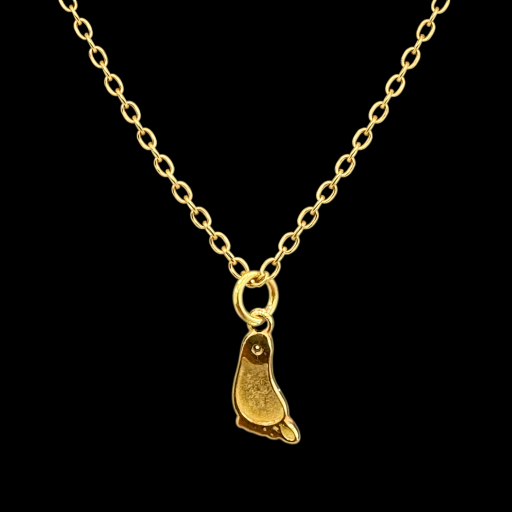Gargantilla de oro 10K con dije de huellita, joyería elegante y delicada, en acabado brillante, ideal para lucir en ocasiones especiales.