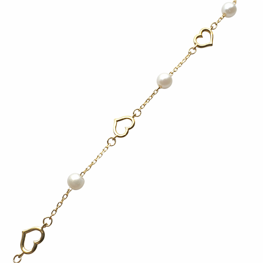 Pulsera de corazones con perlas en oro 10K de Joyería ROMA, elegante y delicada para ocasiones especiales