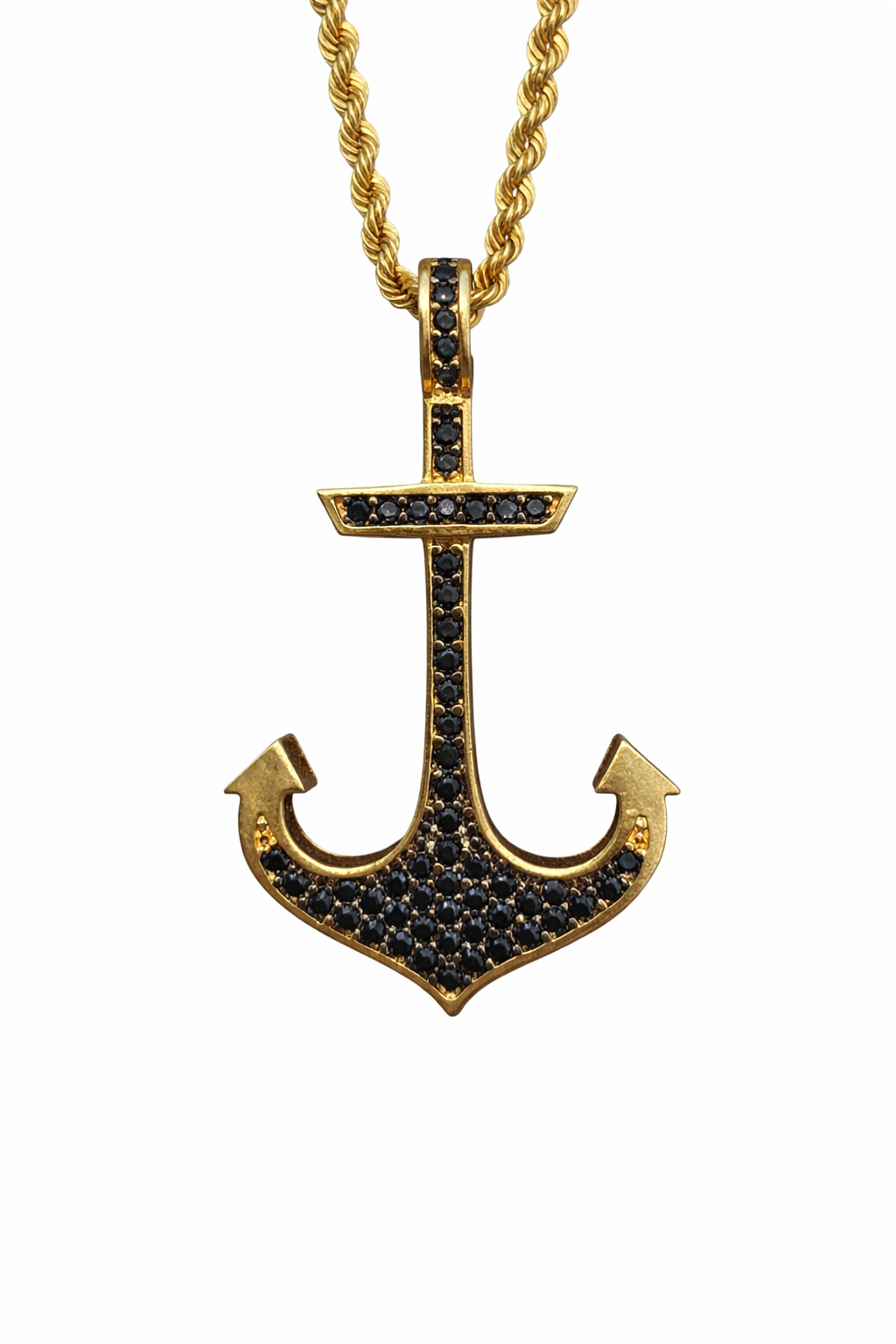 Ancla con zirconias negras en oro 10K, joyería elegante y brillante, ideal para accesorios sofisticados.