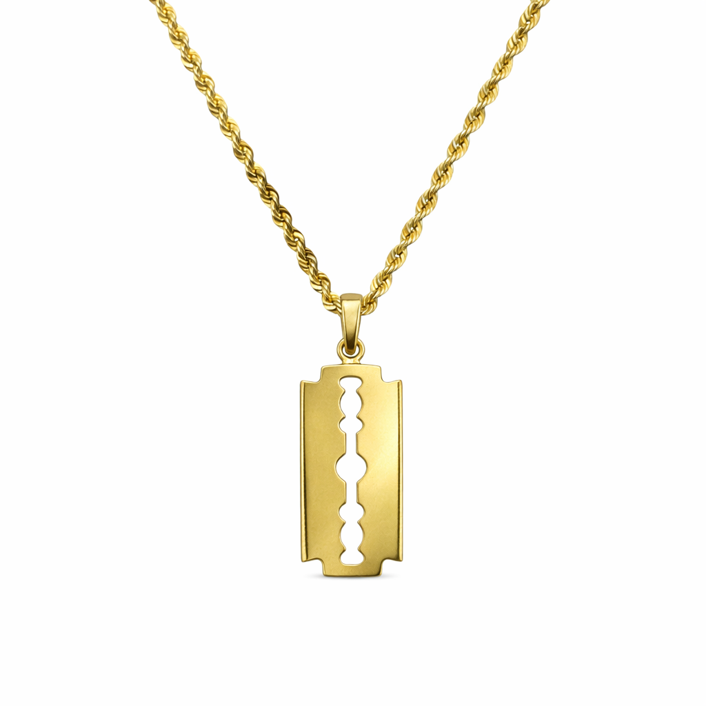 Navaja de oro 10K de Joyería ROMA, con mango dorado y detalles elegantes, en una vista cercana sobre fondo blanco.