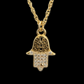 Gargantilla Mano de Fátima en oro 10K con zirconias, joyería elegante y detallada en imagen.