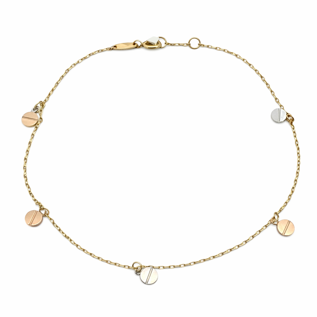 Pulsera de discos bicolor en oro 10K de Joyería ROMA, con diseño elegante y brillante, visible en la imagen.