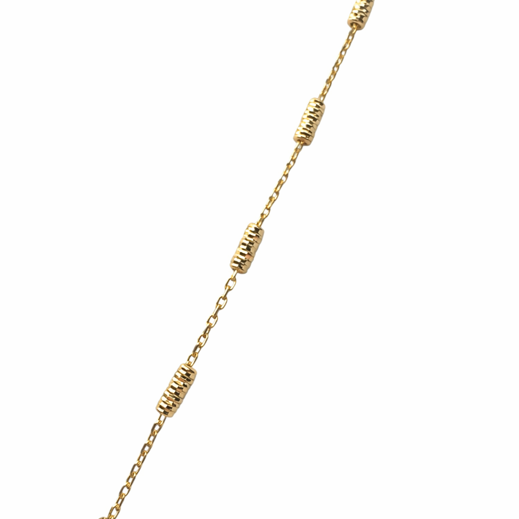 Pulsera de tubos en oro de 10 quilates de Joyería Roma, diseño elegante y brillante para complementar cualquier estilo.