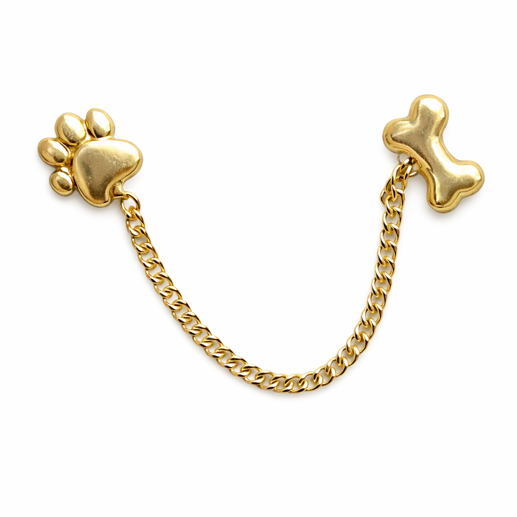 Broquel de huella y hueso en oro 10K con cadena, joyería Roma, diseño elegante y detallado para mujer o pareja.