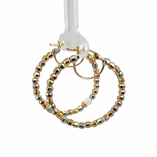 Arracadas tricolor de bolas en oro 10K de Joyería ROMA, con diseño elegante y detalles en varios colores.