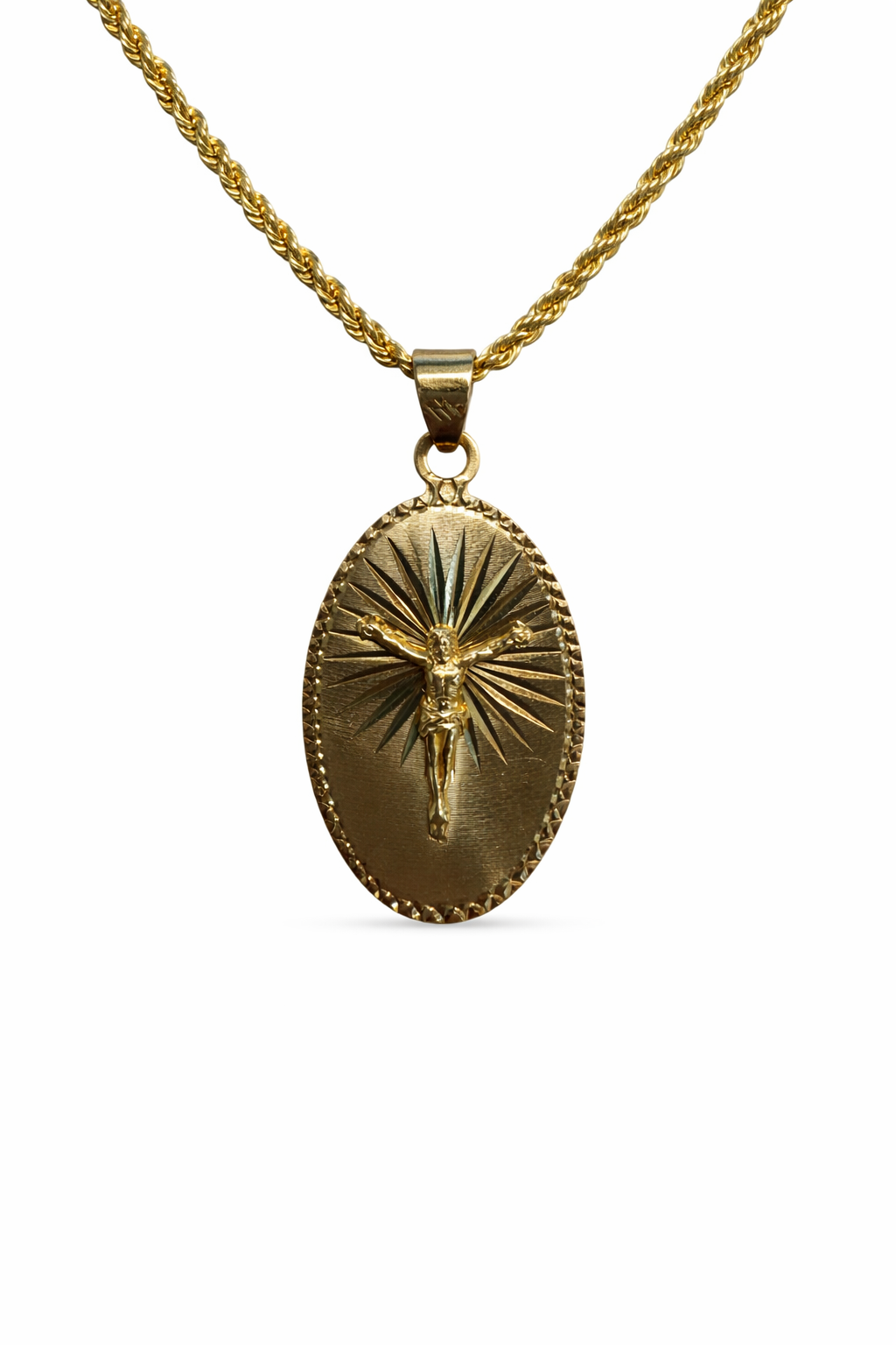 Cristo Resplandor Ovalado en oro 10K, pieza de joyería con detalles religiosos, diseñada por Joyería ROMA