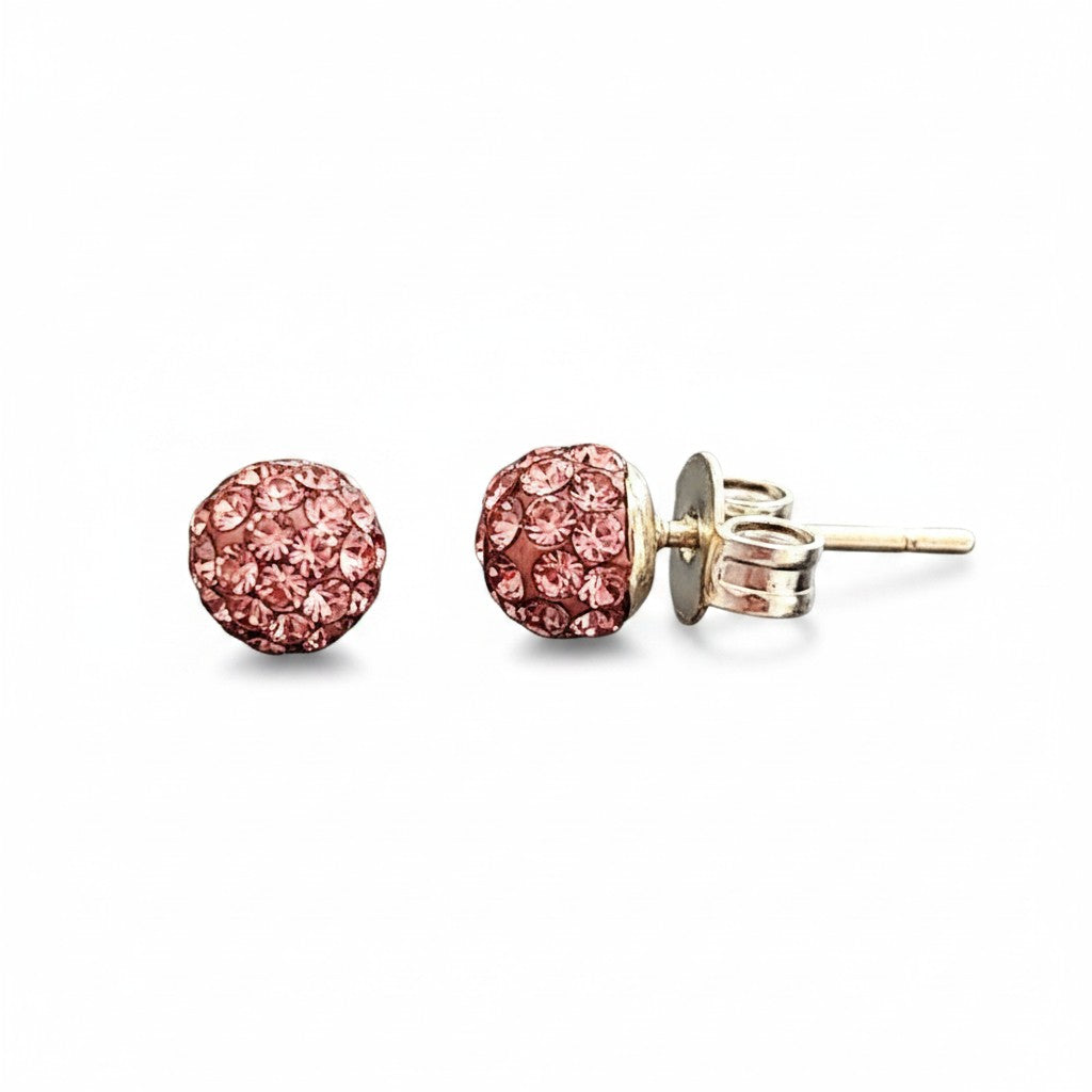 Broquel de pasta multicolor en plata .925, diseñado por Joyería ROMA, con acabado brillante y detalles coloridos en la pieza.