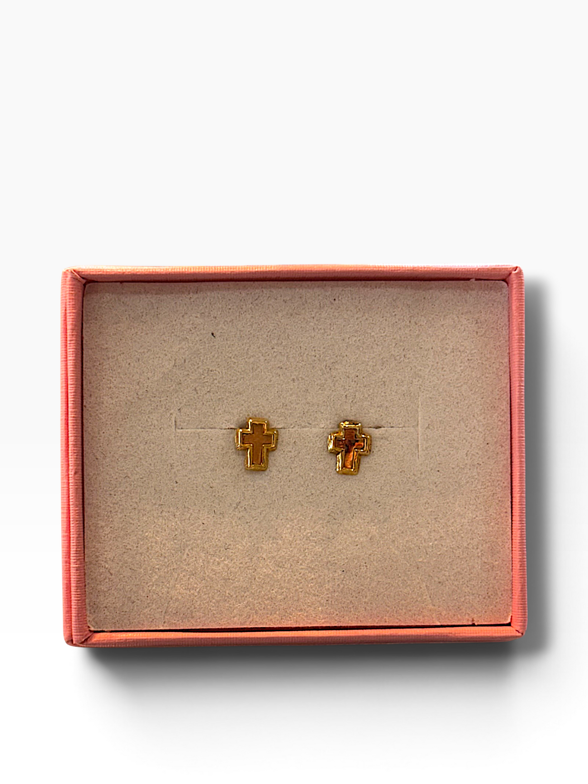 Broquel cruz bicolor en oro de 10K con acabado en oro amarillo y blanco, diseñado por Joyería ROMA.
