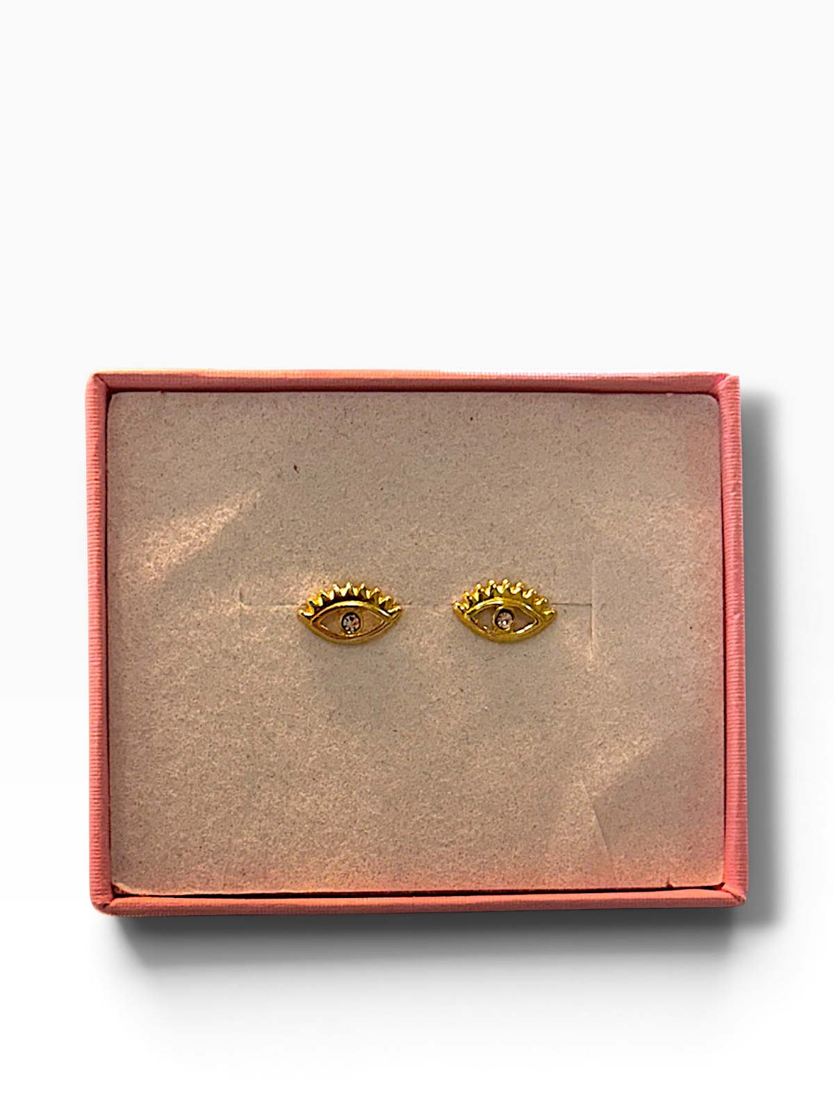 Broquel de ojo protector en oro 10K con diseño elegante, creado por Joyería ROMA, visible en la imagen.