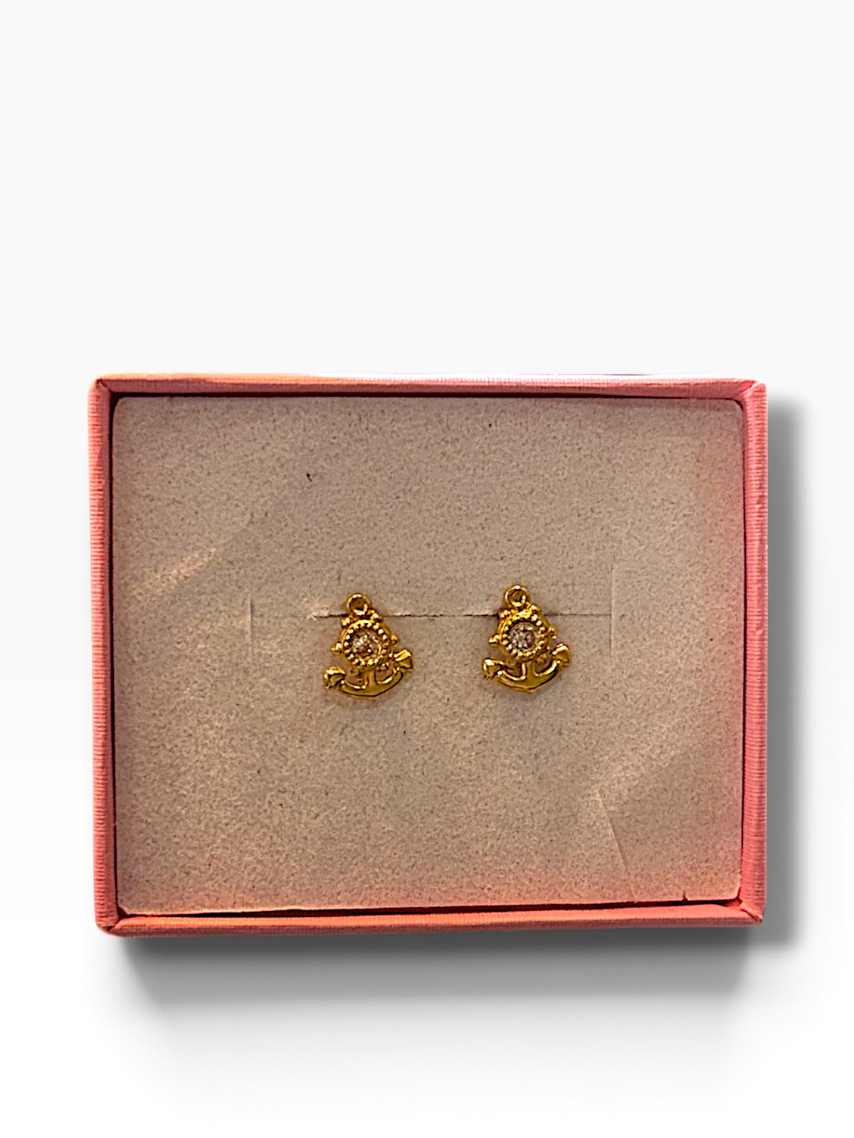 Broquel ancla con zirconia en oro 10K, joyería Roma, con diseño elegante y detalles brillantes en la imagen.