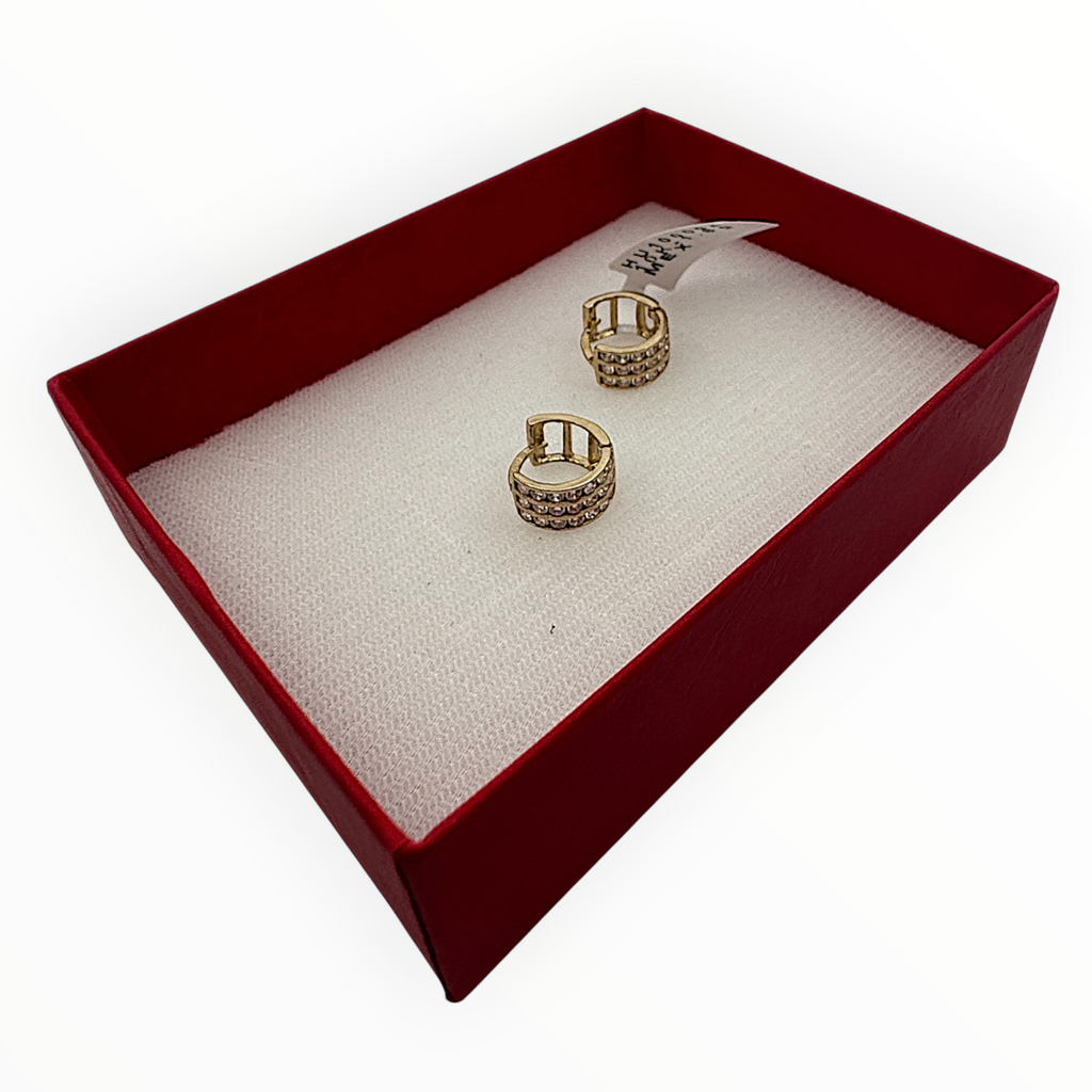 Aretes Huggie de Oro 10K con Zirconias