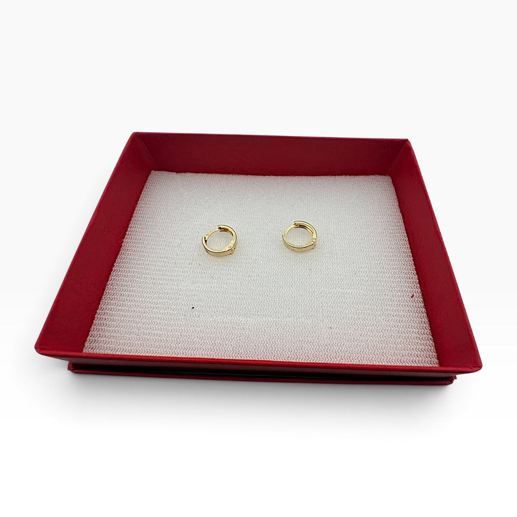 Aretes Huggie Lisos — Oro 10K
