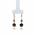 Aretes Largos Huellita — Oro 10K