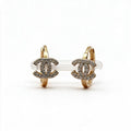 Aretes Huggie con Moño de Zirconias - Oro 10K