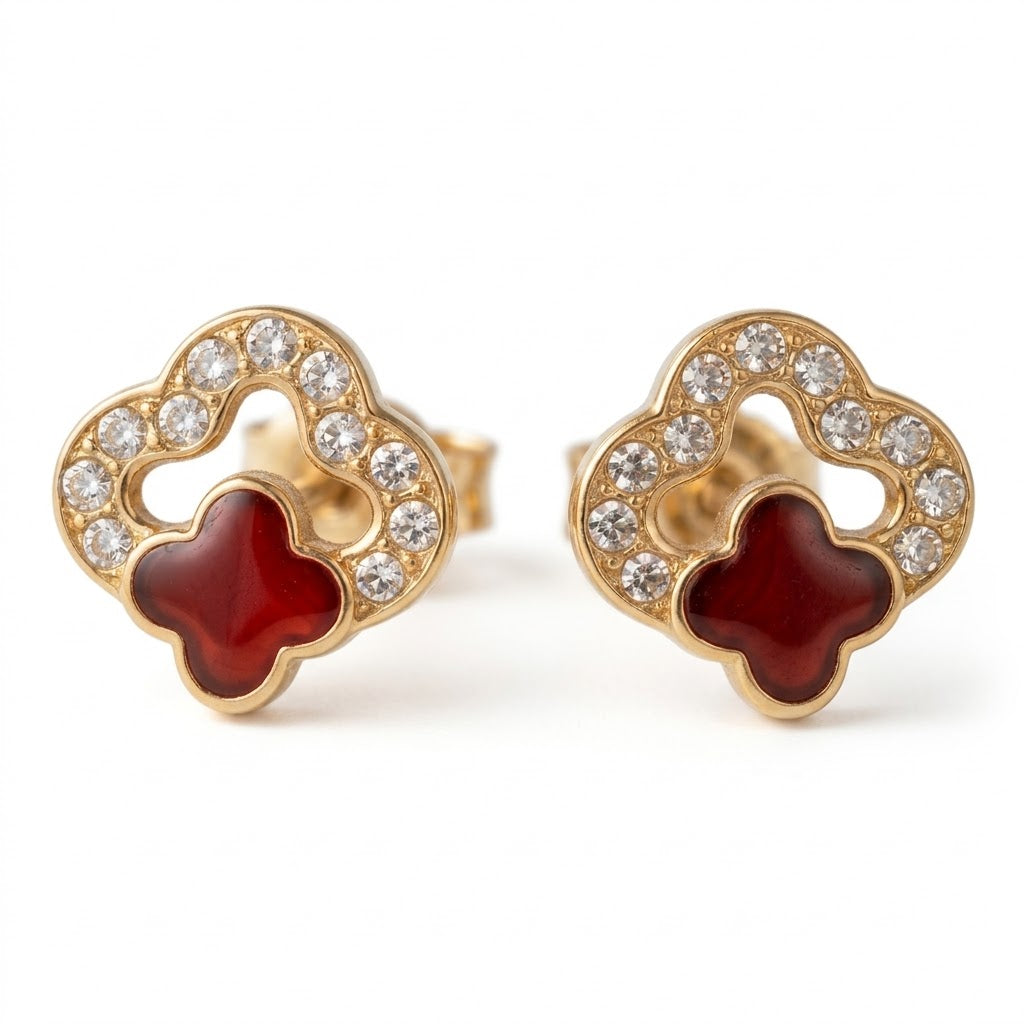 Broquel trébol de zirconia en oro 10K, joyería ROMA, con diseño elegante y detalle brillante en la imagen.