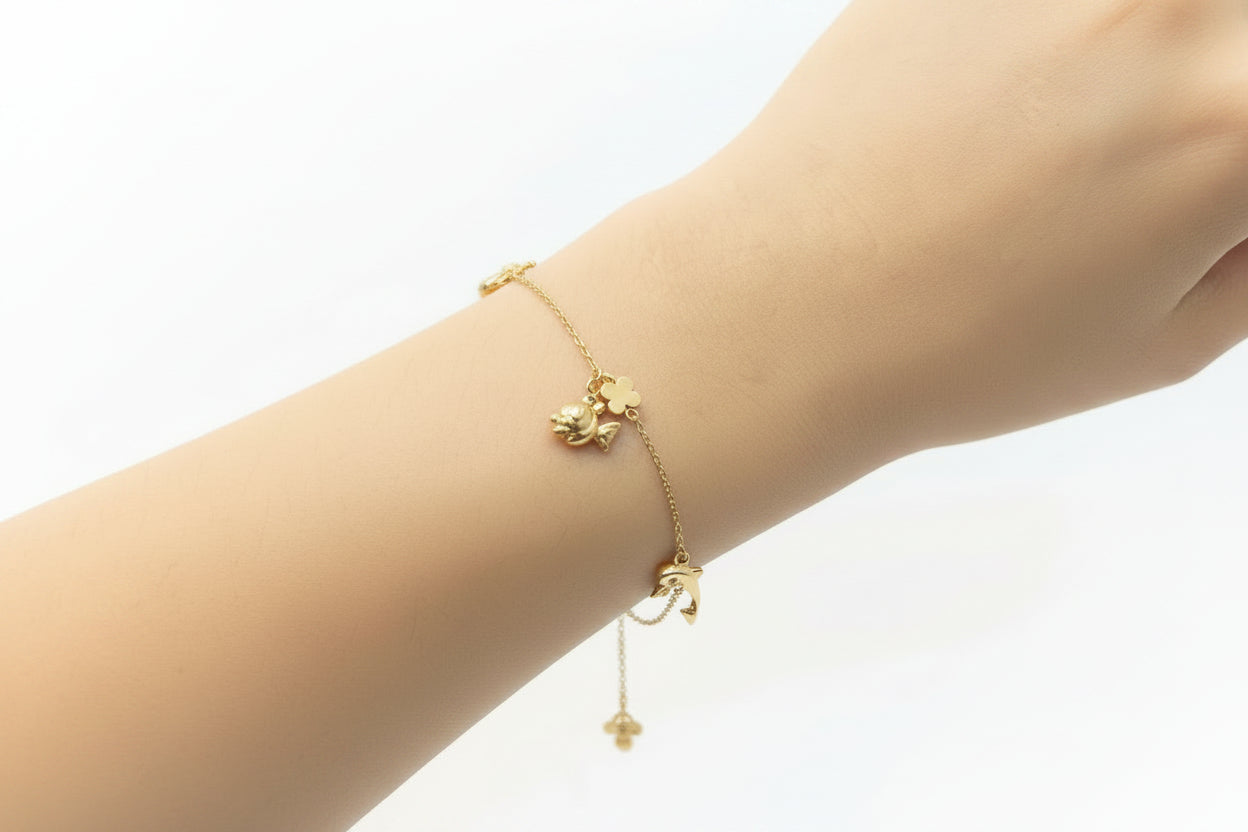 Pulsera Osito, Estrella, Delfín y Pez de Oro 10K