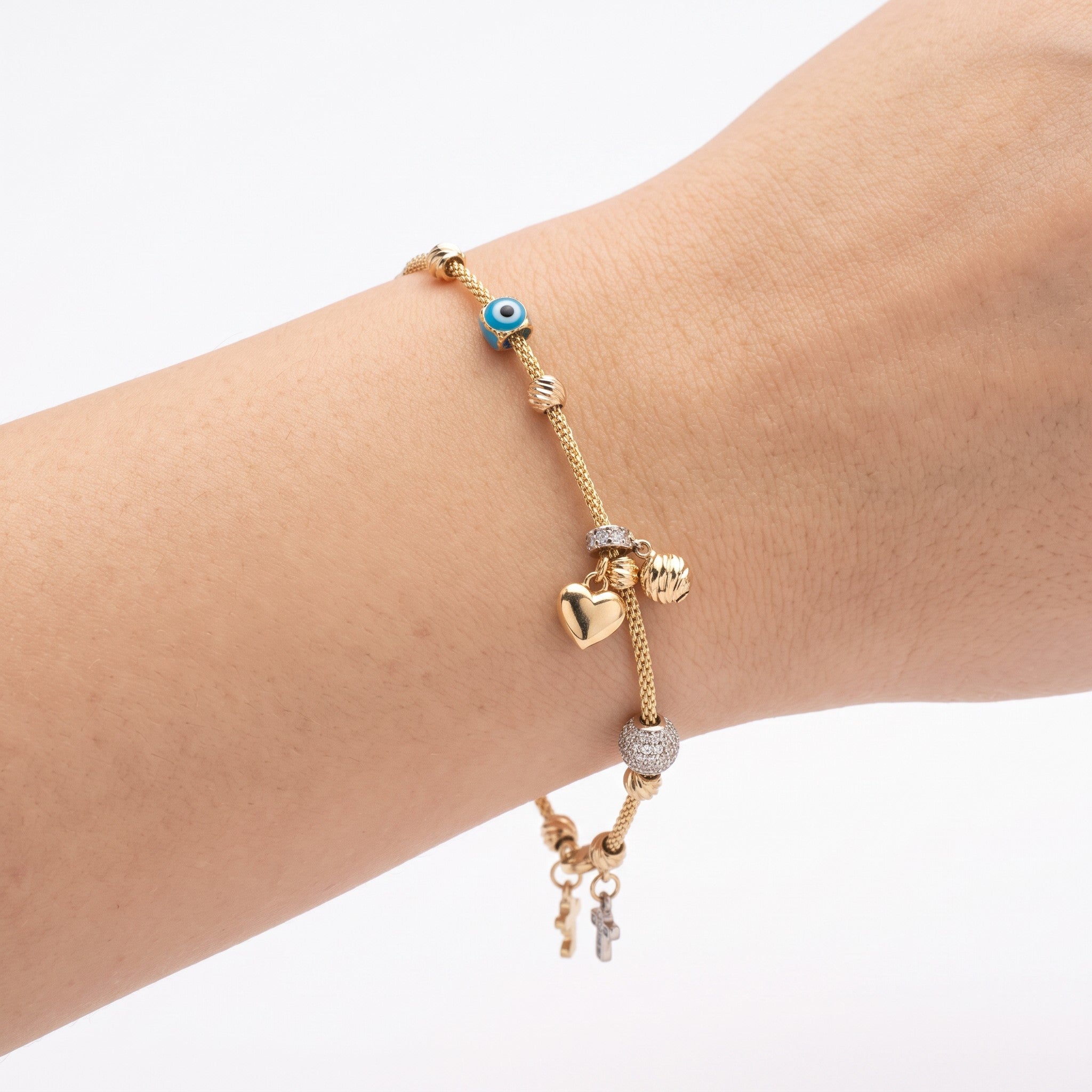 Pulsera Corazón y Ojo Turco de Oro 10K