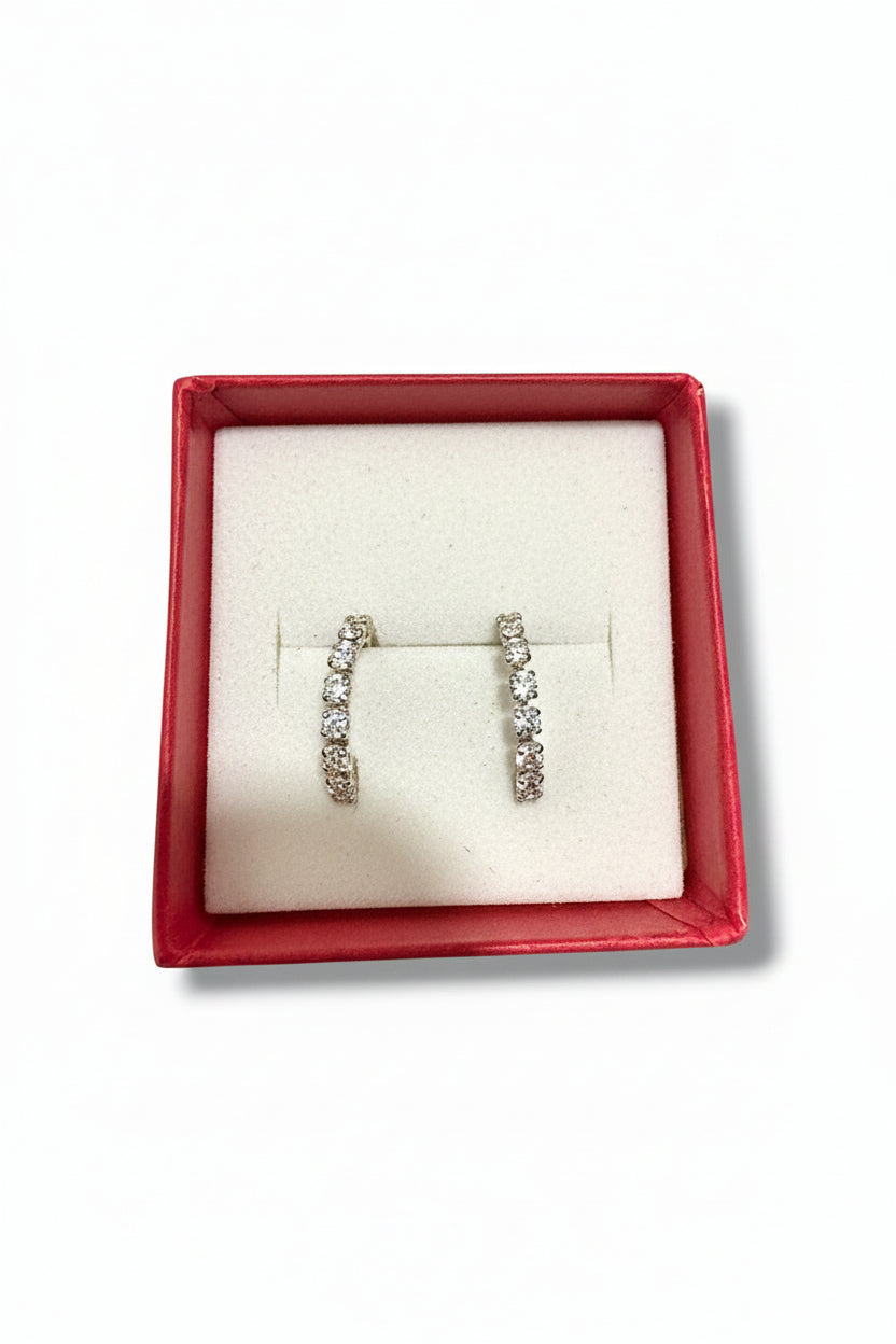 Broquel Línea de Zirconias en Oro 10K