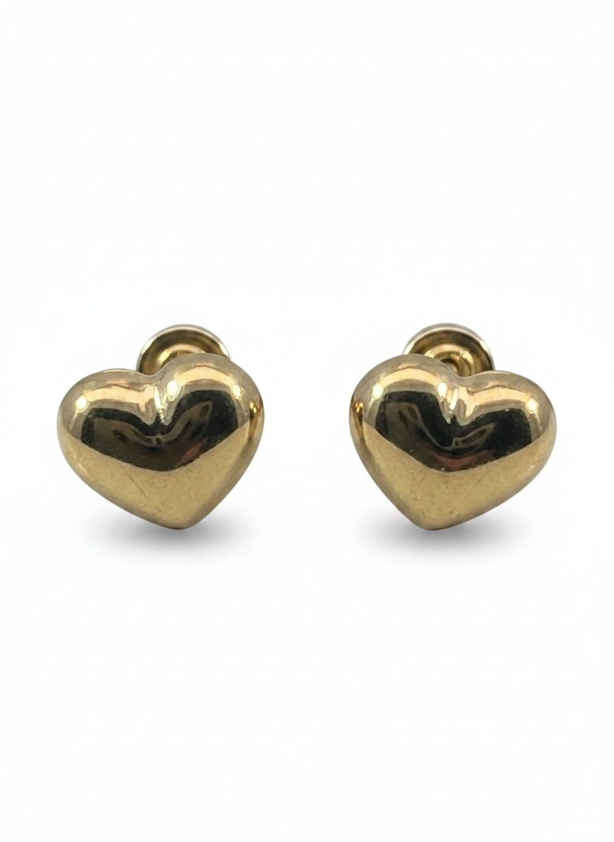 Broquel de corazón inflado en oro 10K de Joyería ROMA, con acabado brillante y diseño elegante.