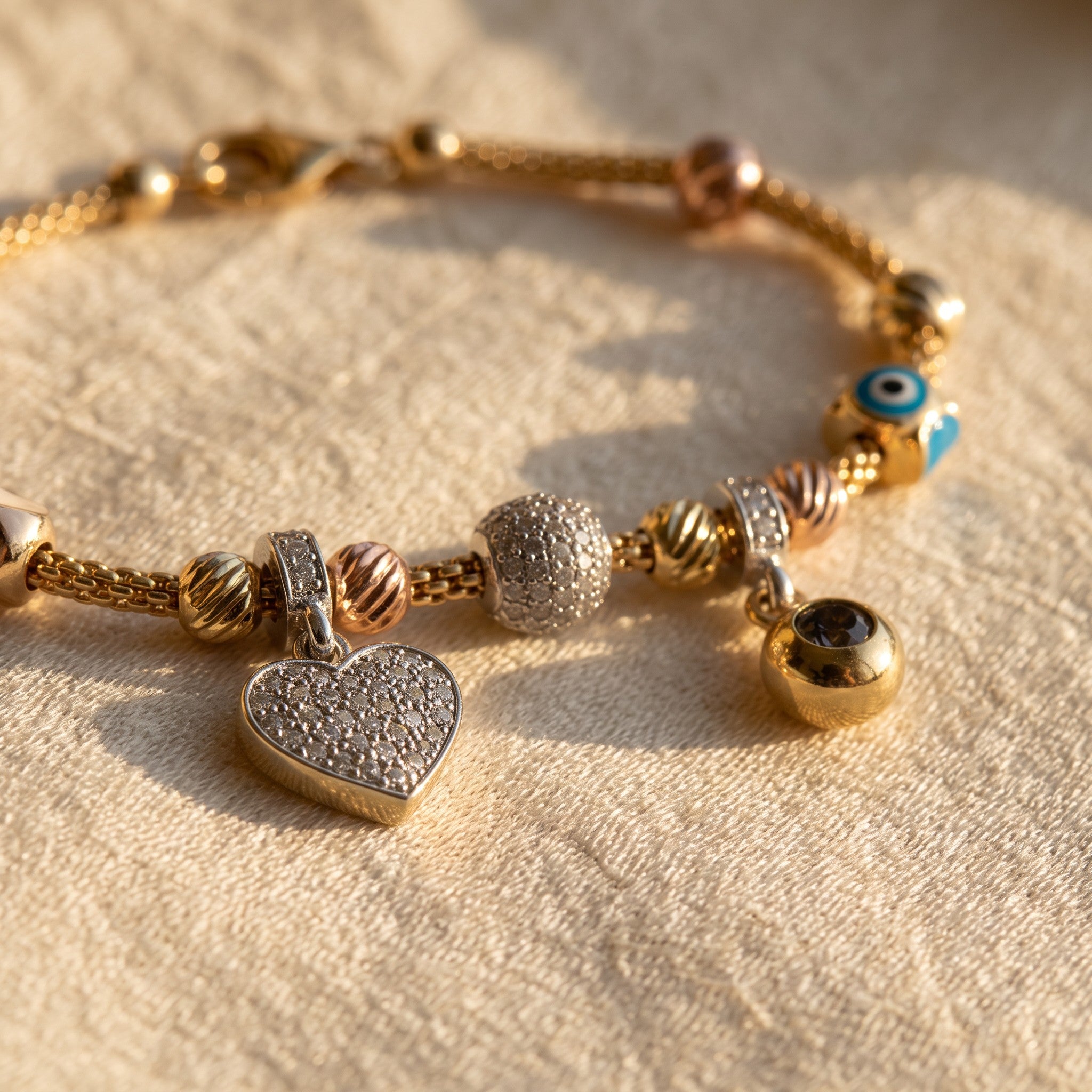 Pulsera Corazón y Ojo Turco de Oro 10K