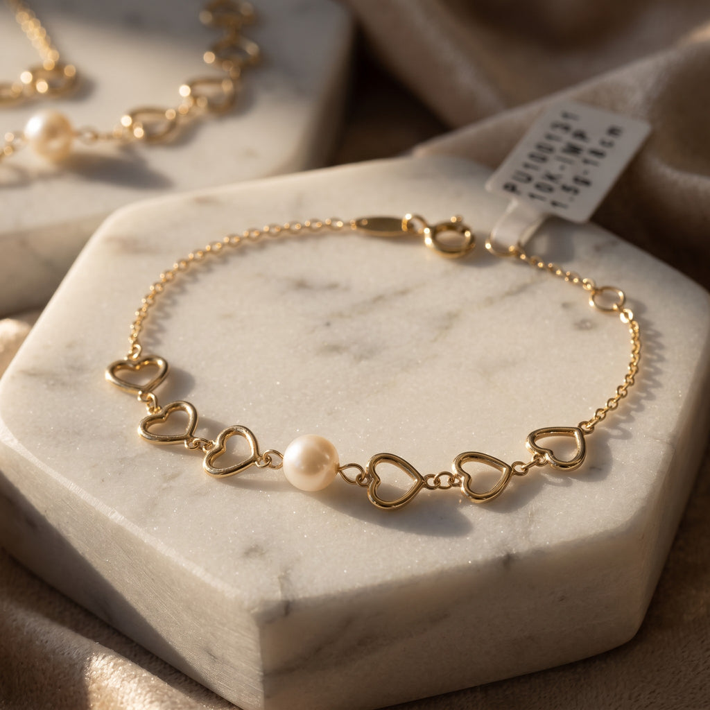 Pulsera Corazones con Perla de Oro 10K