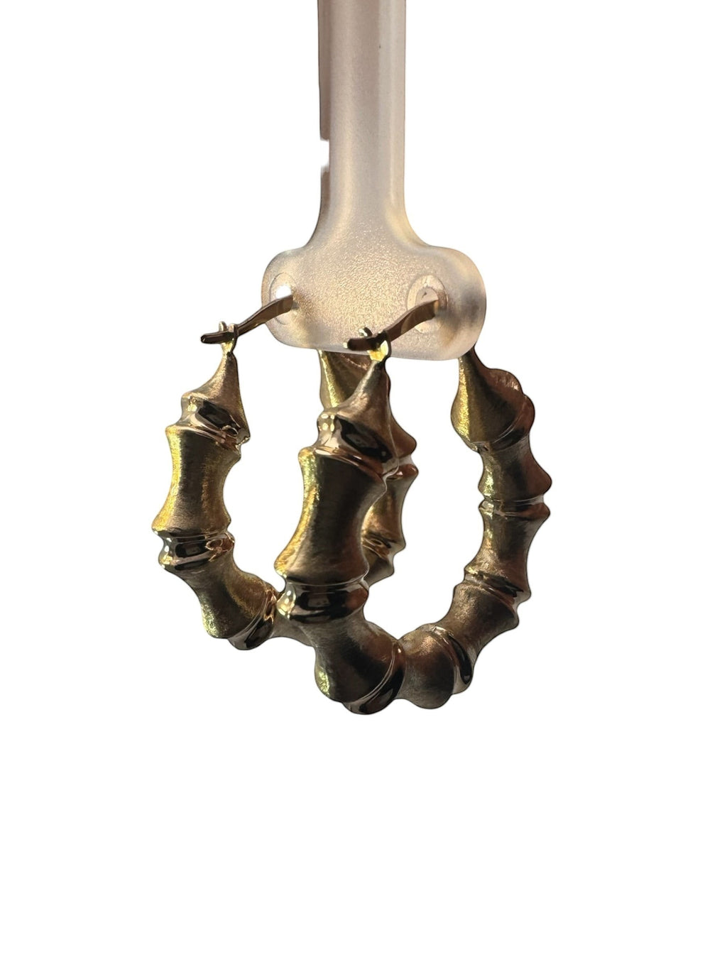 Joyería ROMA 10K yellow gold bamboo hoop earrings with textured design. Elegant and classic.