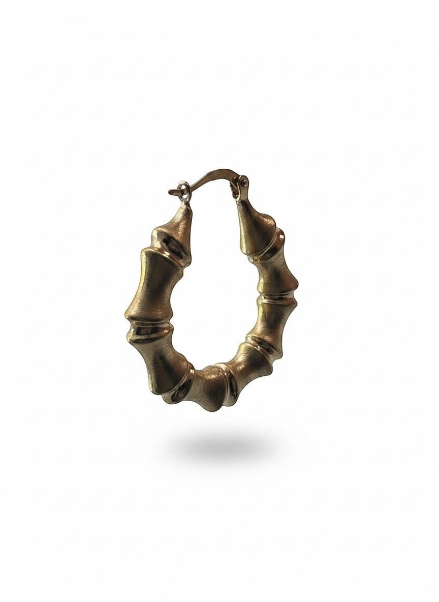 Joyería ROMA 10K yellow gold bamboo hoop earrings with a textured, segmented design.